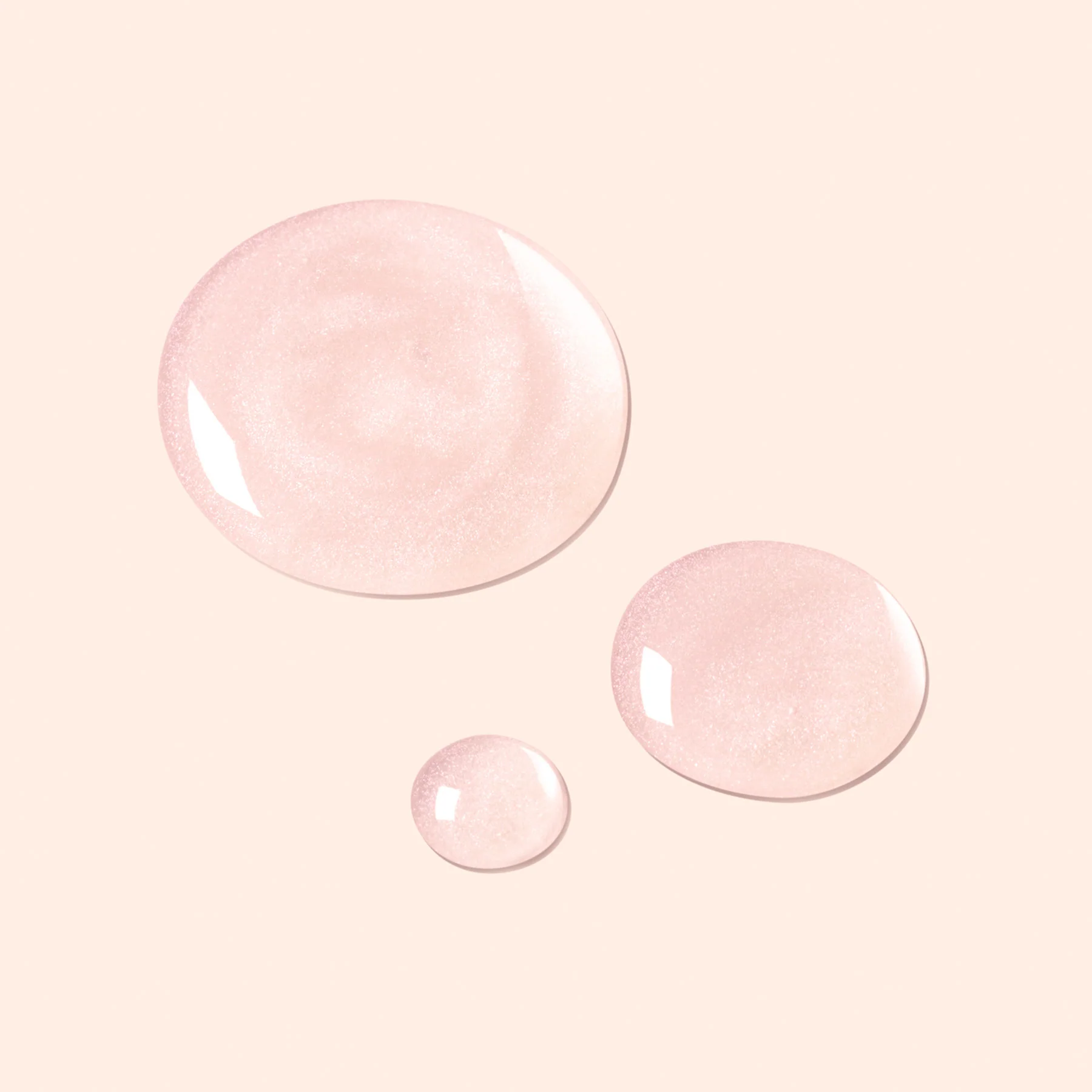 Active Plump lako tekstūra – perlinės rožinės spalvos lašeliai ant paviršiaus